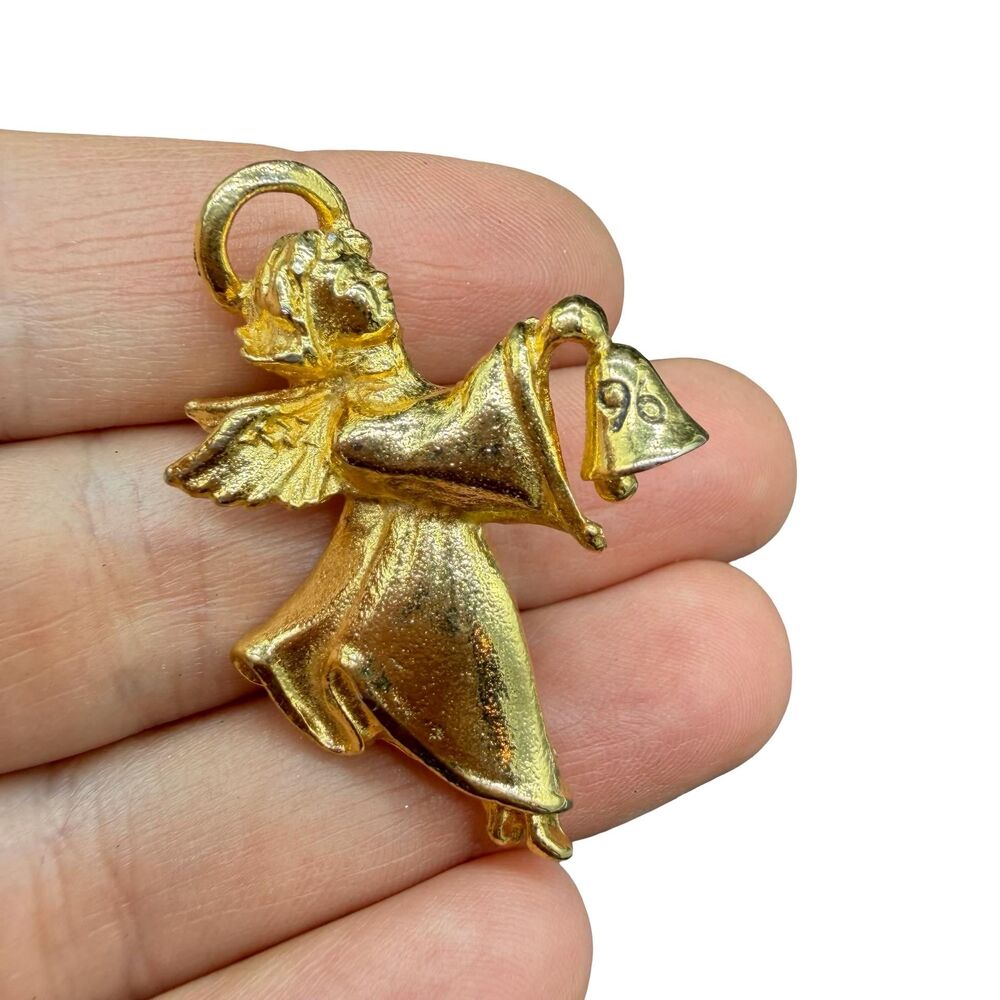 Vintage gold tone 1996 angel ringing bell brooch 96 angel pin